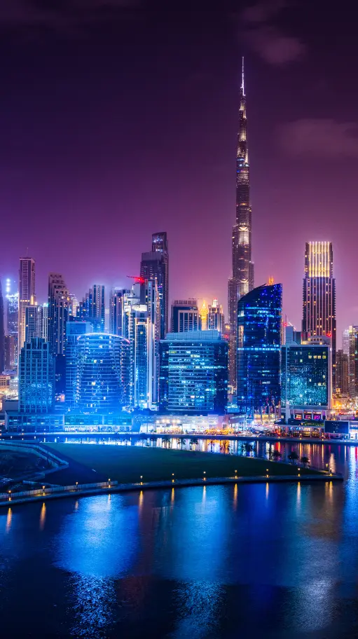 Dubai skyline with Burj Khalifa at night.